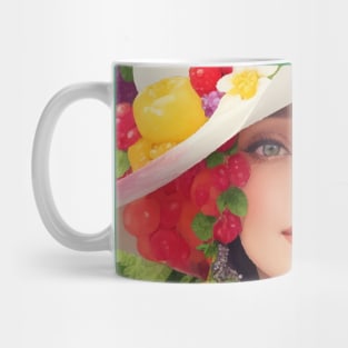 А woman with a white hat and some colorful fruity Mug